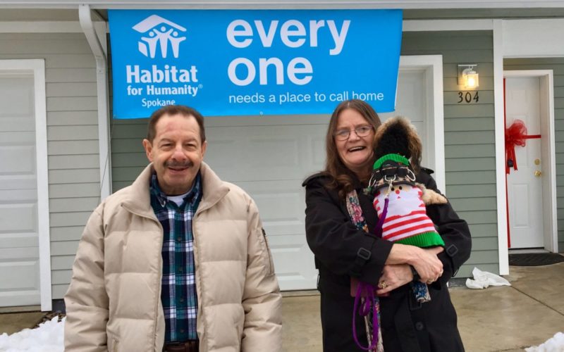 Three Habitat homeowners received their keys on Thursday